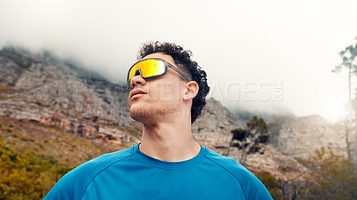 Buy stock photo Thinking, outdoor and man with fitness, sunglasses for uv protection or contemplation. Low angle, reflection or person with shield eyewear, polarized lenses or workout for health benefits or exercise