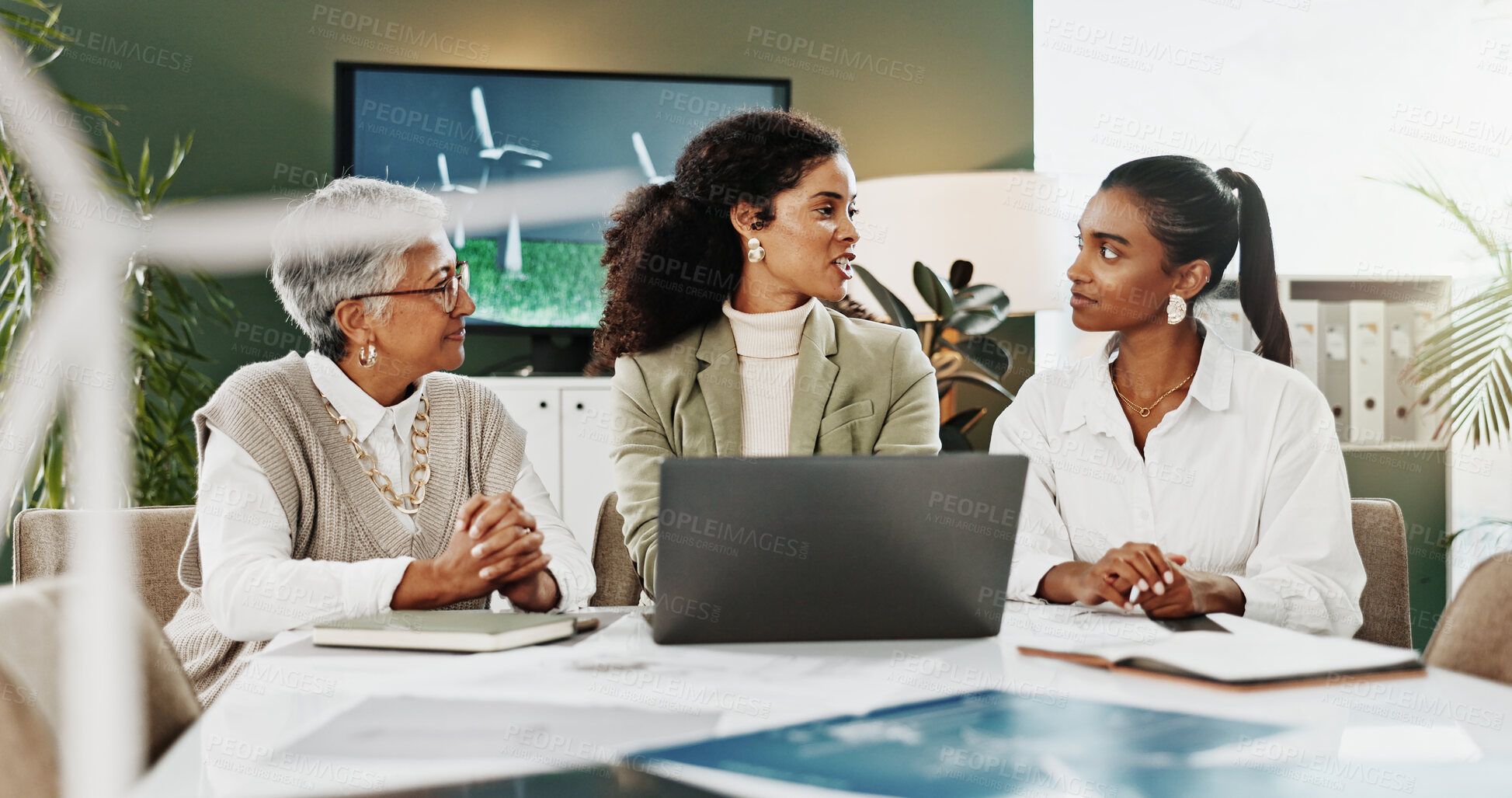 Buy stock photo Laptop, discussion and business women with eco friendly project, clean energy or team proposal. Group, computer and planning in office meeting for sustainability, wind turbine development or idea