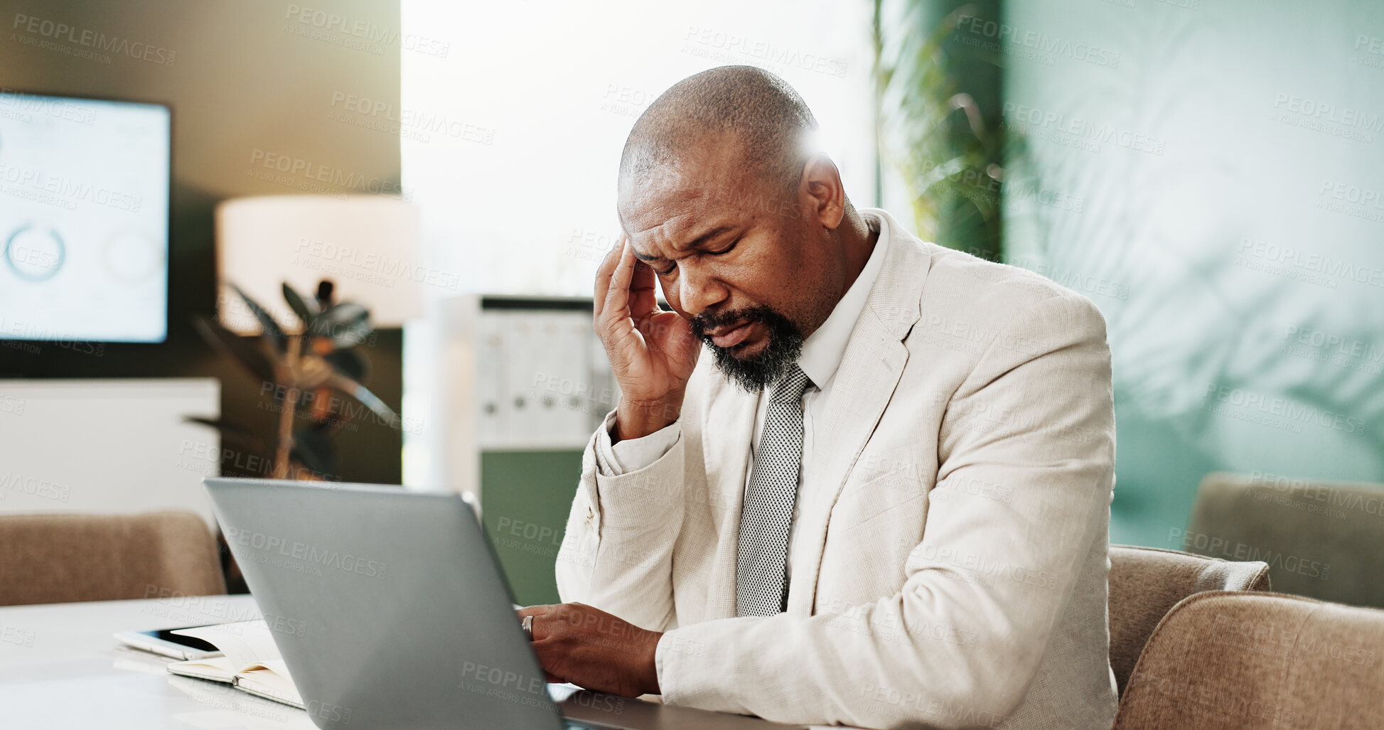 Buy stock photo Headache, laptop and stress with business black man in office for debt or financial burnout. Anxiety, audit and computer with mature African employee in finance workplace for brain fog or migraine