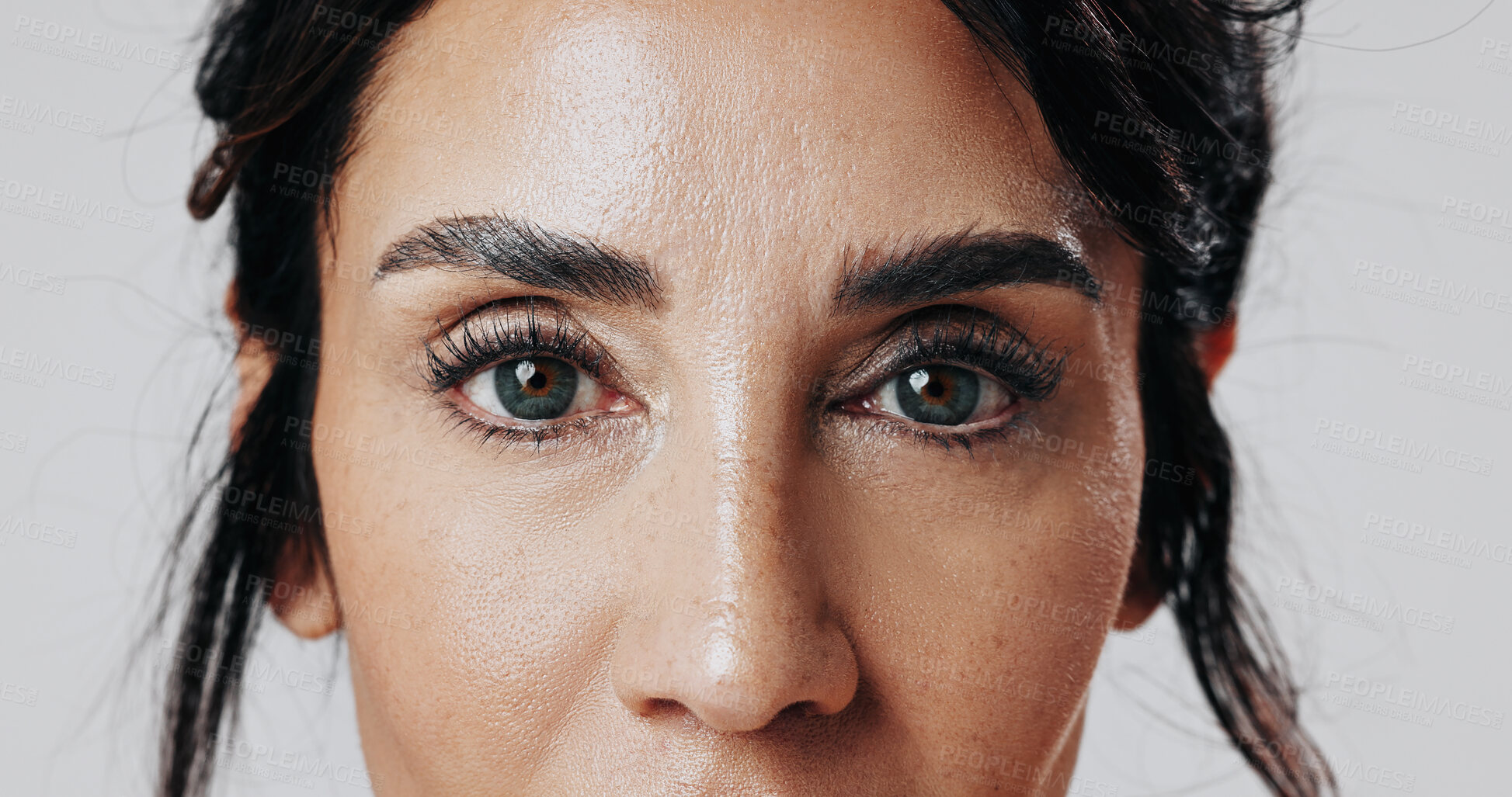 Buy stock photo Portrait, woman and eyes with makeup in studio for beauty, laminated eyebrows and natural glow. Closeup, mature person or cosmetics with lash extension, facial treatment and shine on white background