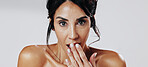 Woman, skincare and surprise with beauty in studio portrait, results and mockup space on white background. Mature person, wow and shock with hand gesture, cosmetics and natural glow in New Zealand