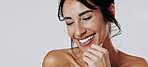 Skincare, laugh or woman in studio with smooth skin, shine or glow in facial care. Wellness, space or person on white background with confidence, dermatology or natural cosmetics for soft touch.