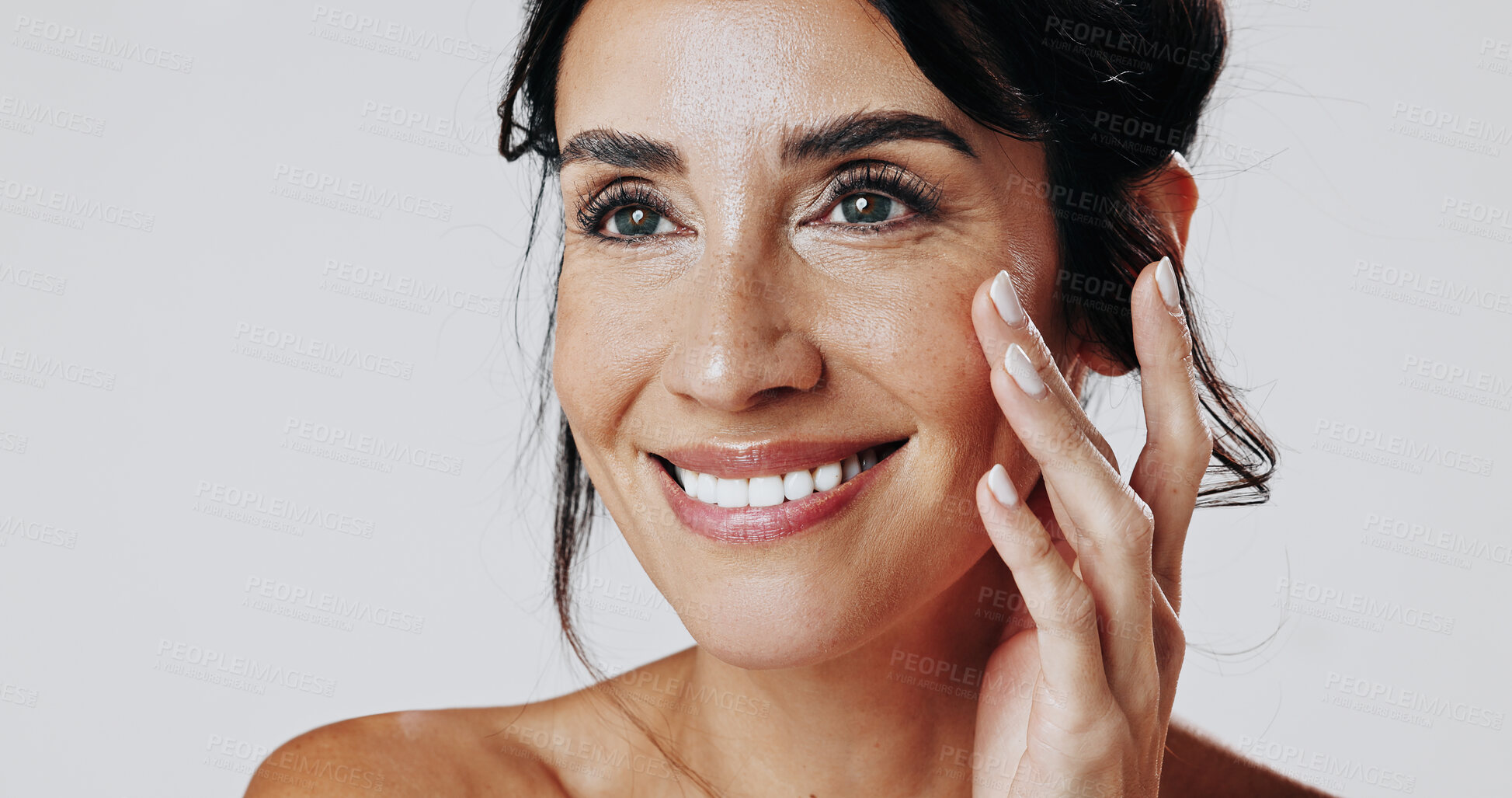 Buy stock photo Skincare, smile and touching with happy woman in studio for cosmetic or dermatology inspiration. Beauty, ideas and satisfaction with mature model isolated on white background for antiaging aesthetic