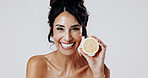 Happy woman, portrait and skincare with lemon in studio for detox on a white background. Female person, model or smile with natural organic citrus fruit for anti aging diet, vitamin C or antioxidants