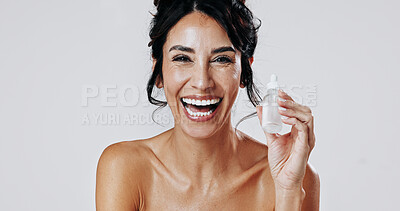 Buy stock photo Laughing, portrait and serum with woman in studio for cosmetic satisfaction or dermatology product. Bottle, funny and skincare with mature model isolated on white background for antiaging treatment