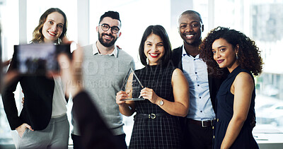 Buy stock photo Woman, team and photo with trophy at office for goals, achievement and support at legal advisory agency. People, group and profile picture with celebration, award and diversity at corporate law firm