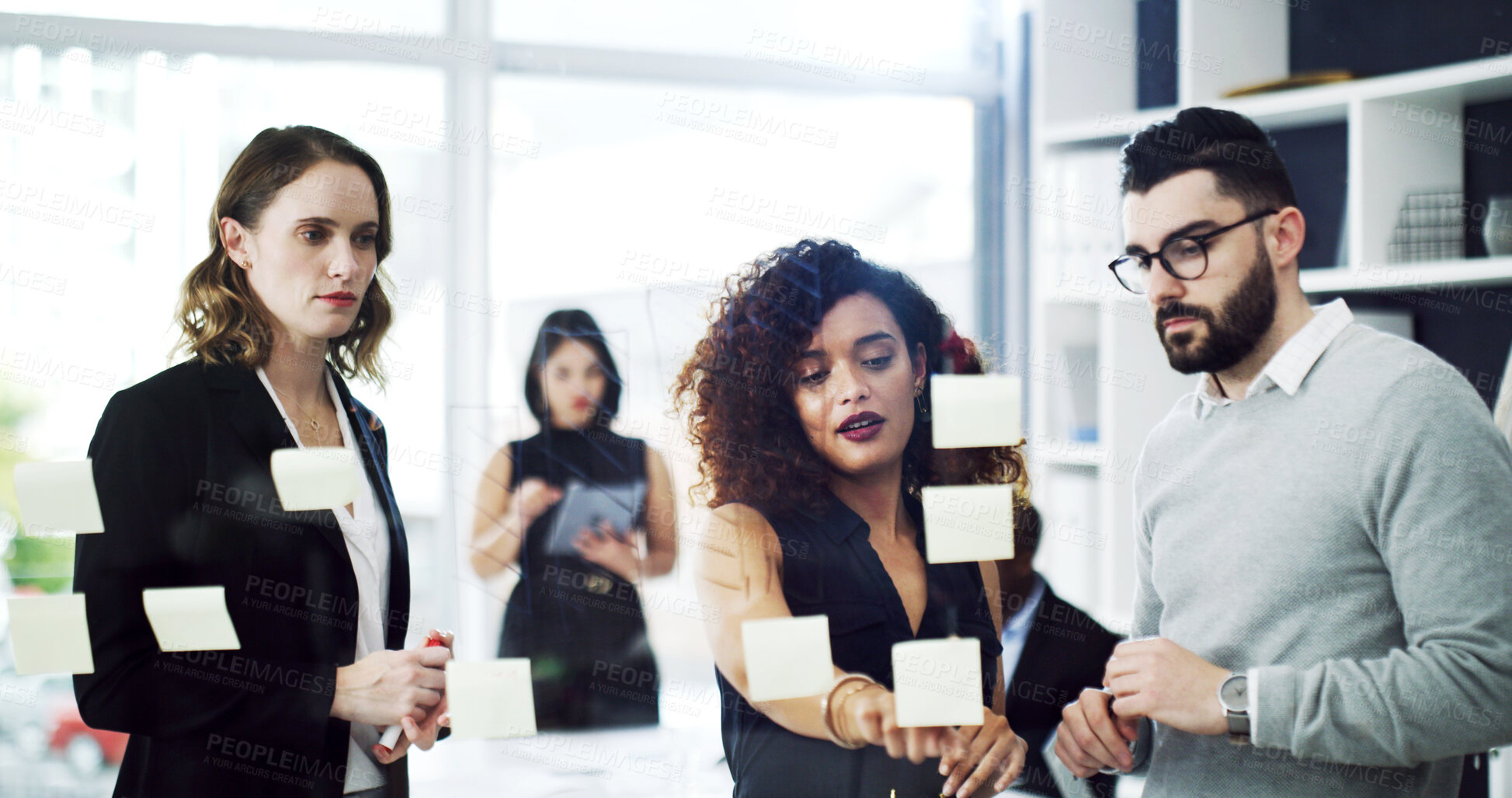 Buy stock photo Woman, team and sticky note on glass at office with planning, attorney and insight for solution. People, legal consultant and group with discussion, feedback and problem solving at corporate law firm