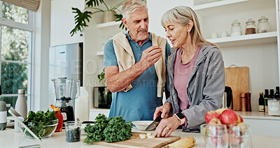 Buy stock photo Blender, fruit and old couple in kitchen with healthy diet, taste test or natural ingredients. Married senior people, chop banana or sample food in house with smoothie recipe, nutrition or breakfast.