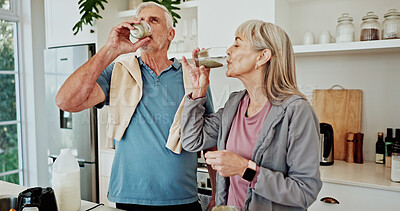 Buy stock photo Exercise, drinking smoothie and old couple in kitchen for nutrition, breakfast and supplements. Fitness, mature man and woman in home, health and protein shake for wellness, diet plan and minerals
