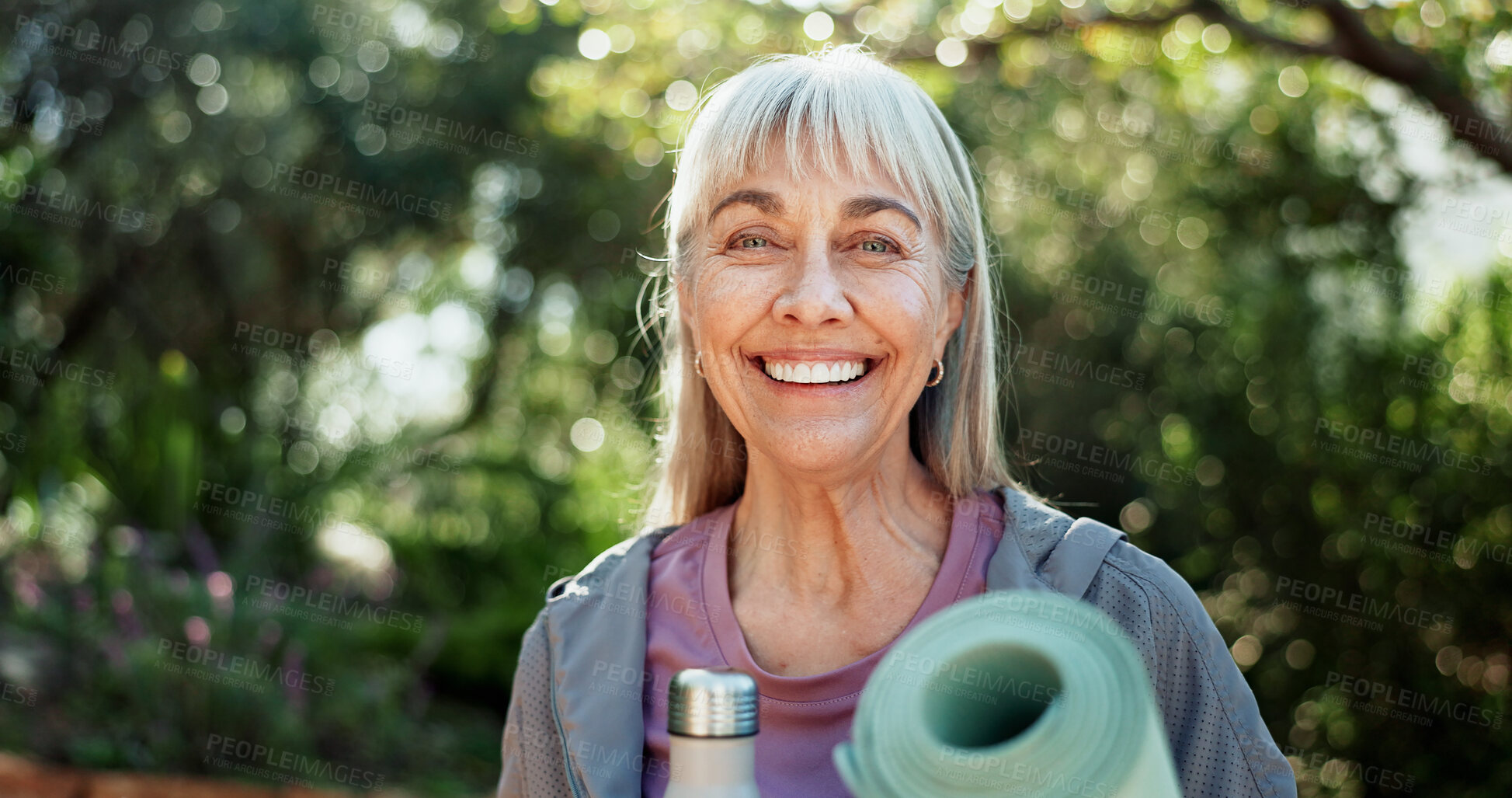 Buy stock photo Portrait, fitness and old woman in garden, yoga mat and exercise for health benefits. Outdoor, pensioner and senior person in backyard, prepare for pilates and water bottle for nutrition and smile