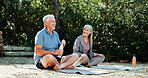 Yoga, conversation and old couple in garden, fitness and meditation for health benefits, funny and relax. Outdoor, joke and senior man with happy woman, exercise for wellness and laughing for humor