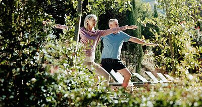 Buy stock photo Yoga, stretching and elderly couple in backyard, holistic exercise and morning routine for body wellness. Active, chakra and senior people with warrior pose in garden, balance and retirement fitness
