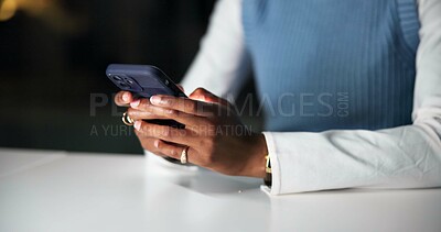 Buy stock photo Hands, phone and typing with business woman in office at night for communication or update. App, mobile and text message with employee at desk in dark workplace for browsing or scrolling social media