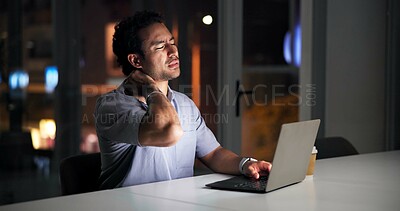 Buy stock photo Burnout, laptop and neck pain with business man in office at night for online research deadline. Computer, crisis and stress with employee at desk in dark workplace for anxiety or muscle fatigue