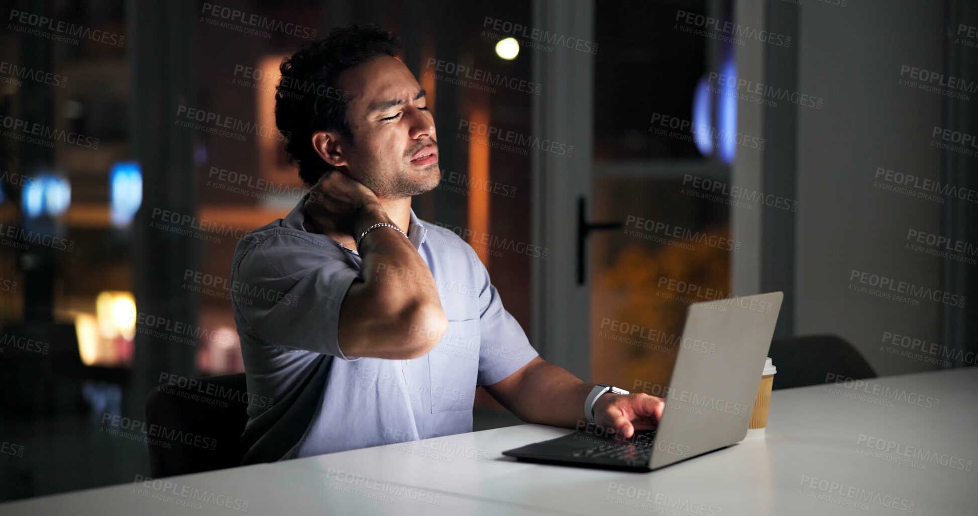 Buy stock photo Burnout, laptop and neck pain with business man in office at night for online research deadline. Computer, crisis and stress with employee at desk in dark workplace for anxiety or muscle fatigue