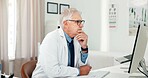 Computer, doctor and thinking with man in office  of hospital for telehealth report, medical diagnosis or research. Healthcare expert, virtual consulting or treatment update with mature person