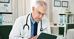 Tablet, doctor and reading with man in office  of hospital for telehealth advice, medical diagnosis or feedback. Healthcare expert, online report or treatment update with mature person in clinic
