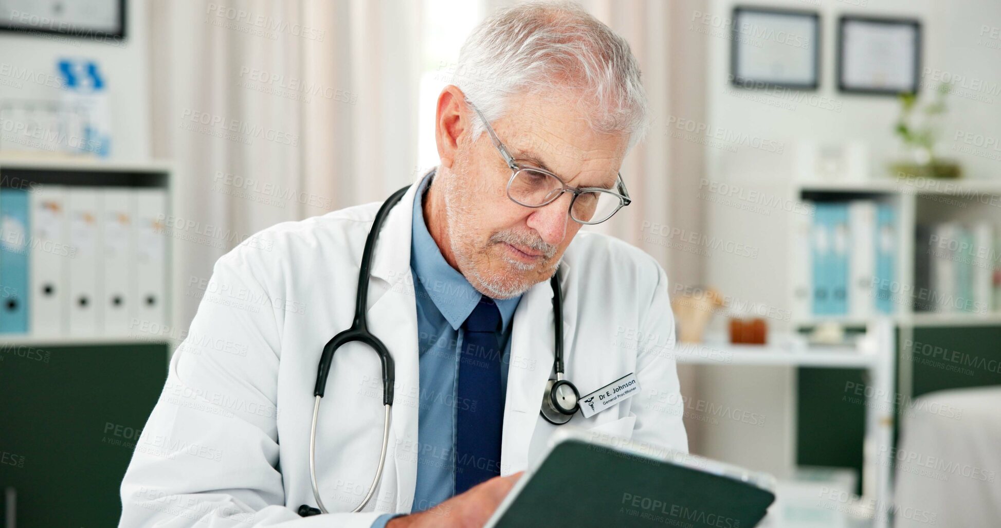 Buy stock photo Tablet, doctor and reading with man in office  of hospital for telehealth advice, medical diagnosis or feedback. Healthcare expert, online report or treatment update with mature person in clinic