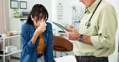 Buy stock photo Consultation, sick and doctor with woman in hospital for flu, allergies or sinus. Checkup, illness and mature healthcare worker with female patient blowing nose at medical examination in clinic