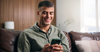 Buy stock photo Relax, happy and man on sofa with phone for social media, online message and chat in home. Weekend, house and person on smartphone for internet, connection and typing for notification on mobile app