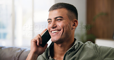 Buy stock photo Man, phone call and relax on sofa with smile, happy and chat or gossip in home living room. Person, smartphone and conversation on couch with social networking, communication and speaking in lounge