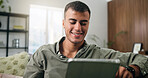 Man, tablet and reading on sofa for social media, communication or entertainment in home living room. Male person, smile and relax on lounge couch with technology for online streaming and search