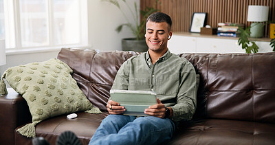 Buy stock photo Happy, tablet and man on sofa with earphones for online videos, subscription and watching movies. Home, streaming and person on digital tech for internet, website and connection to relax on weekend