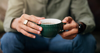 Buy stock photo Coffee, hands and man on sofa with break, peace or calm morning with warm beverage. Espresso, relax and male person with cappuccino, latte or tea for wellness or reflection in living room of house