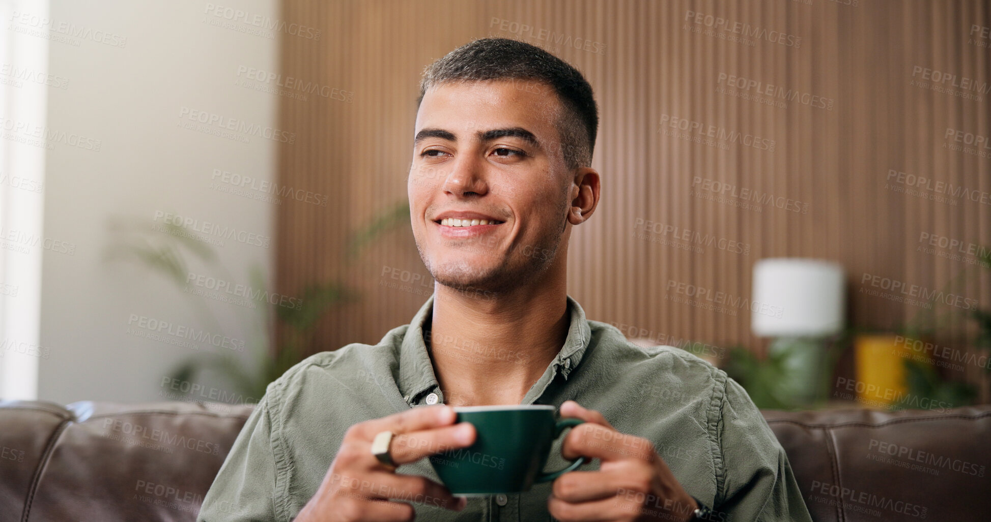 Buy stock photo Coffee, smile and man on sofa with break, peace or calm morning with warm beverage. Espresso, relax and male person with cappuccino, latte or tea for wellness or reflection in living room of house