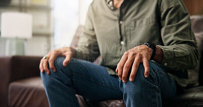 Buy stock photo Hands, sofa and person with anxiety in home for thinking, stress or mental health in living room. Legs, frustrated or ptsd in lounge with overthinking, nerves or remember trauma on couch at apartment