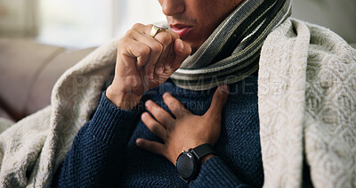 Buy stock photo Hands, cough and sick on sofa with blanket for chest pain, flu and rest in lounge with recovery at house. Person, illness and cold symptoms with congestion, comfort or healing in living room at home
