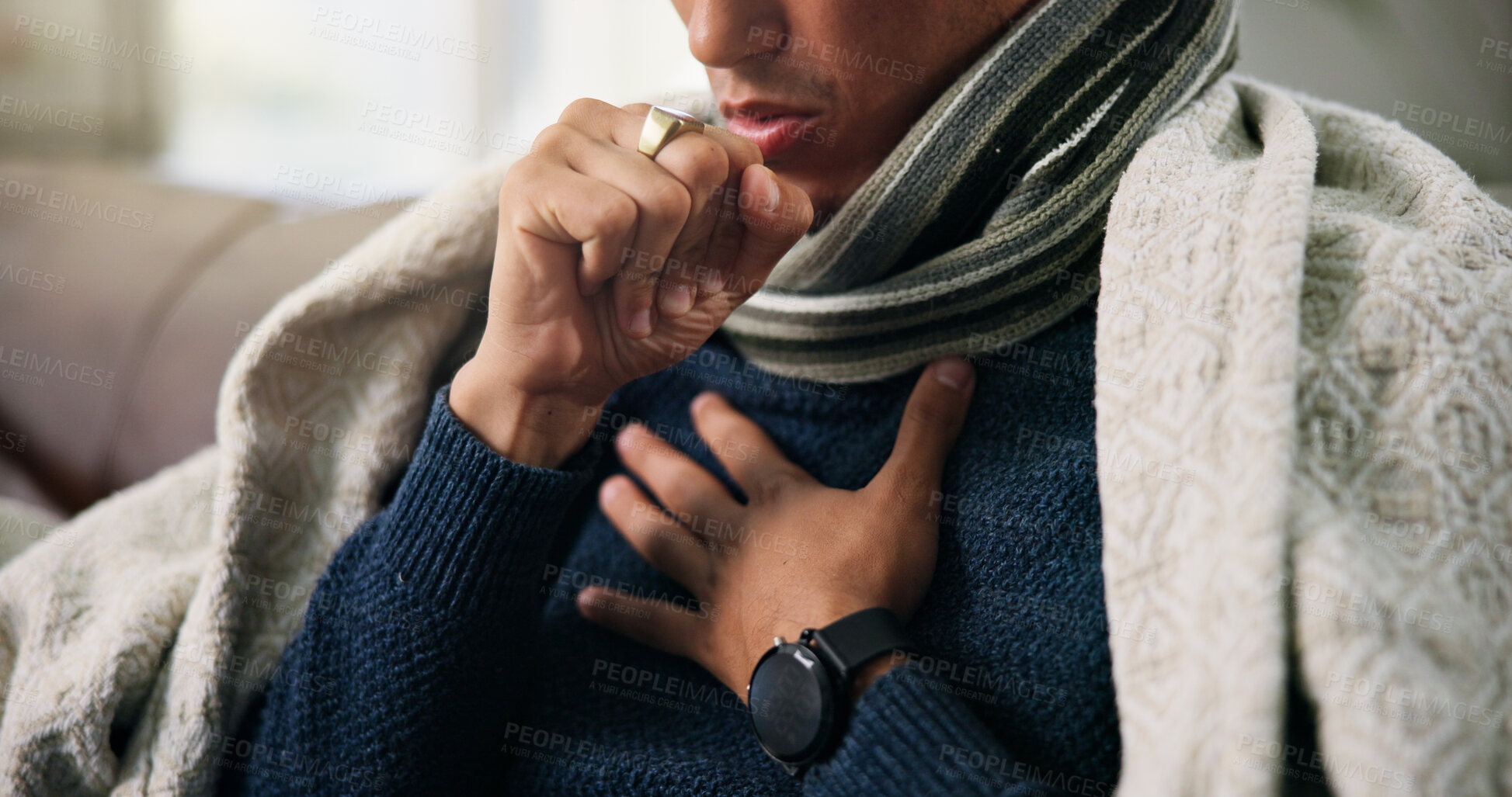 Buy stock photo Hands, cough and sick on sofa with blanket for chest pain, flu and rest in lounge with recovery at house. Person, illness and cold symptoms with congestion, comfort or healing in living room at home