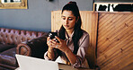 Laptop, woman and reading phone in cafe for bad review, small business manager and stock mistake. Owner, person and serious with tech in restaurant for customer complaint, app feedback or poor rating