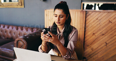 Buy stock photo Laptop, woman and reading phone in cafe for bad review, small business manager and stock mistake. Owner, person and serious with tech in restaurant for customer complaint, app feedback or poor rating