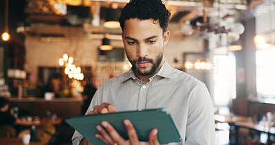 Buy stock photo Tablet, manager and man in restaurant for online inventory, update website and orders. Small business, hospitality and person on tech for digital menu, stock checklist and work schedule in cafe