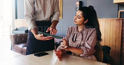 Buy stock photo Woman, waiter and tablet with menu at cafe for order, customer experience and choice at restaurant. People, tech and application for digital price list, service or decision with guide at coffee shop