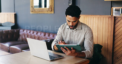 Buy stock photo Tablet, man and research on laptop in cafe for remote work, editing article or compare news source. Freelancer, journalist or tech in restaurant for proofreading draft, editor feedback or online blog