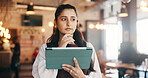 Thinking, woman and employee with tablet in cafe, reporter and planning for magazine story or ideas. Creative, person and reflection for article deadline, serious and journalist with tech for project