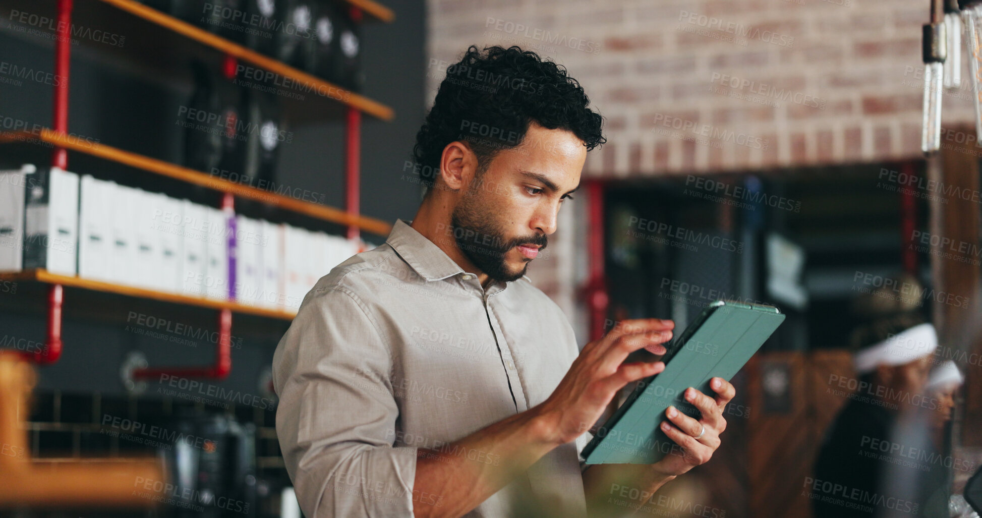Buy stock photo Manager, man and scroll in restaurant with tablet, booking website and notification for online order. Management, person and reading in diner with tech, hospitality service and email for reservation.