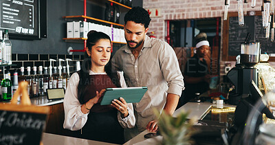 Buy stock photo Entrepreneur, couple and reading on tablet in coffee shop, menu management or digital price update. Online order app, review sales or people with food list optimization, tech or remove sold out items