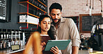 Entrepreneur, speaking or couple with tablet in coffee shop, menu management or remove sold out items. Online order app, review sales or people with food list optimization, tech or price update talk
