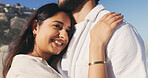 Hug, smile and thinking with couple on beach together for anniversary, date or honeymoon in summer. Chest, love and romance with happy woman embracing man outdoor for bonding or relationship security