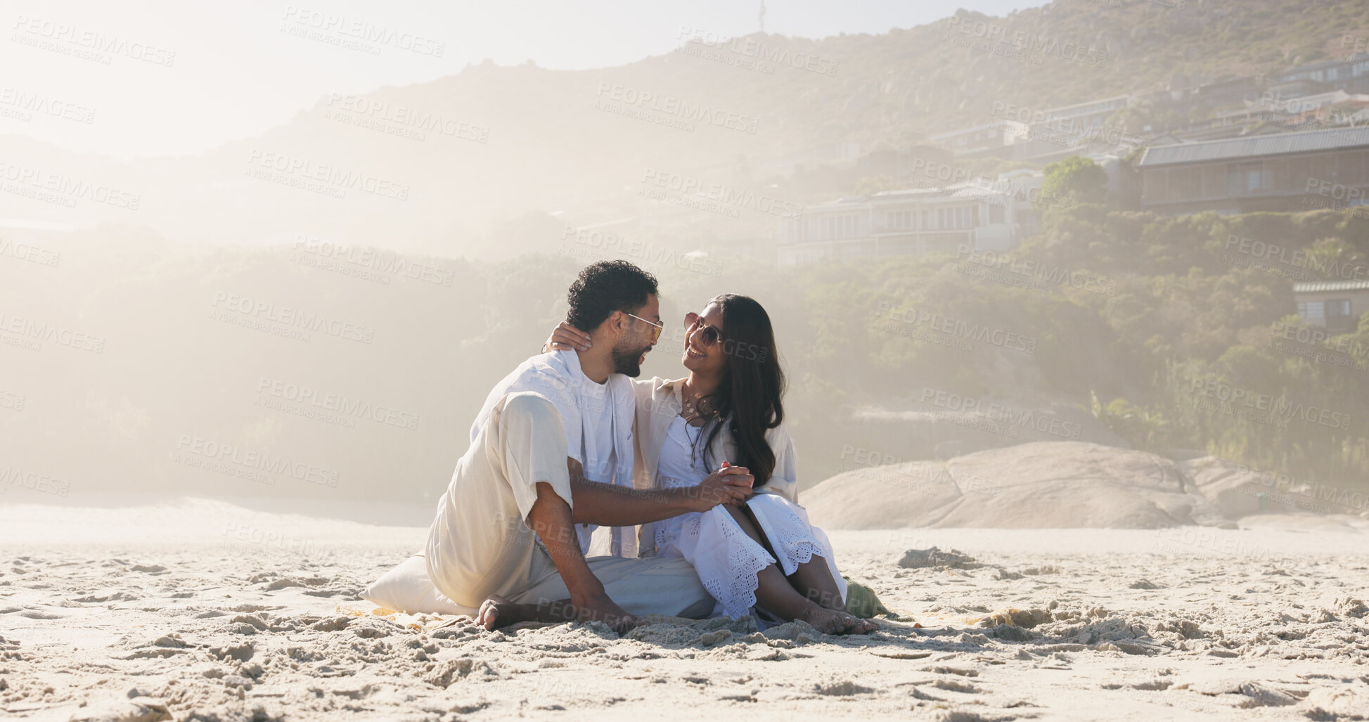 Buy stock photo Travel, hug or couple on beach sand with smile, commitment or bonding together on summer holiday. Love, man or woman with embrace, romantic connection or healthy relationship on outdoor vacation.