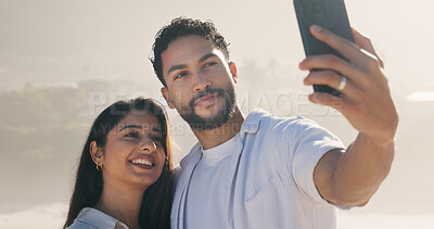 Buy stock photo Travel, smile and selfie with couple on beach for love, summer and vacation together. Profile picture, man and woman with date for holiday, bonding and online post for weekend break and relax or trip