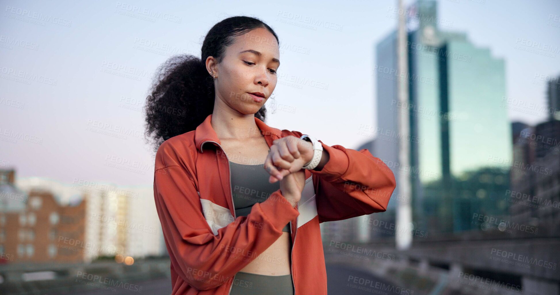 Buy stock photo Woman, fitness and smart watch with timer in city for break, monitor or check heart rate on bridge. Gen z girl, runner and stopwatch with iot clock, rest and app with for exercise in urban town