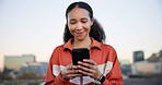 Happy woman, fitness and phone with texting in city on break, notification and space on bridge. Gen z girl, runner and smartphone with mobile app, smile or rest with scroll for exercise in urban town