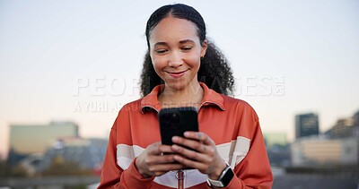 Buy stock photo Happy woman, fitness and phone with texting in city on break, notification and space for chat. Gen z girl, runner and smartphone with mobile app, smile or rest with scroll for exercise in urban town
