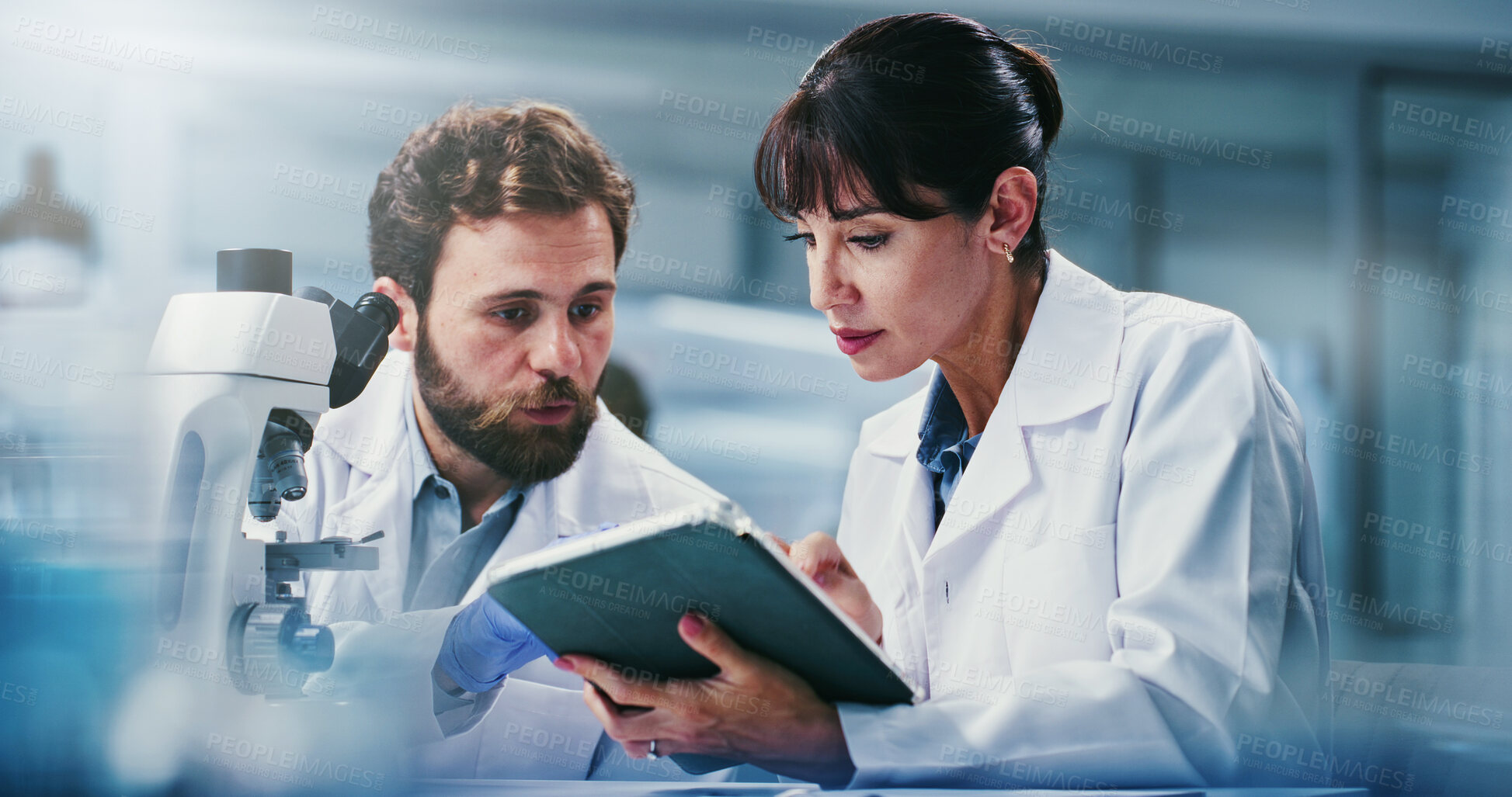 Buy stock photo Tablet, research and people in lab, science and discussion for experiment results. Scientist, man and woman in meeting, teamwork and biotech for pharmaceutical review and feedback for investigation