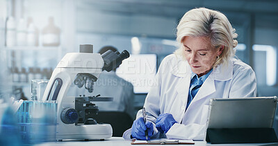 Buy stock photo Woman, scientist and writing with clipboard at lab for notes, medical research and insight for virus cure. Mature person, admin and checklist for progress report, feedback or pharma study for vaccine