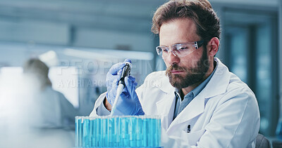 Buy stock photo Scientist, glasses and man with pipette, lab and drug development for metabolic disease and research. Serious, healthcare worker and person with liquid, innovation and medical study for diabetes cure